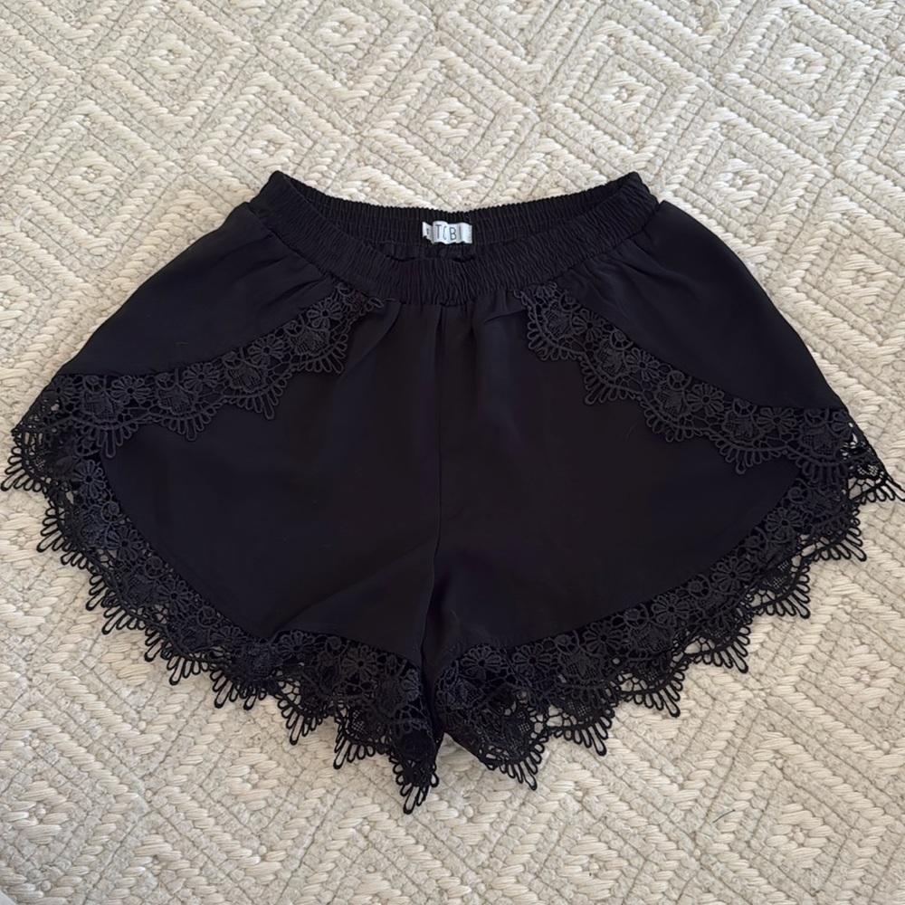 Women’s black shorts with lace trim, size small